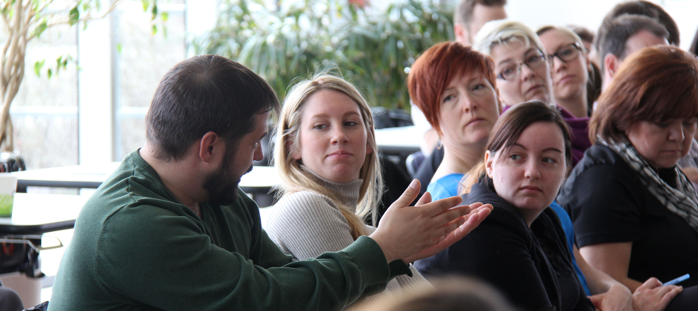 CWB National Leasing employees take part in discussion following poverty simulation