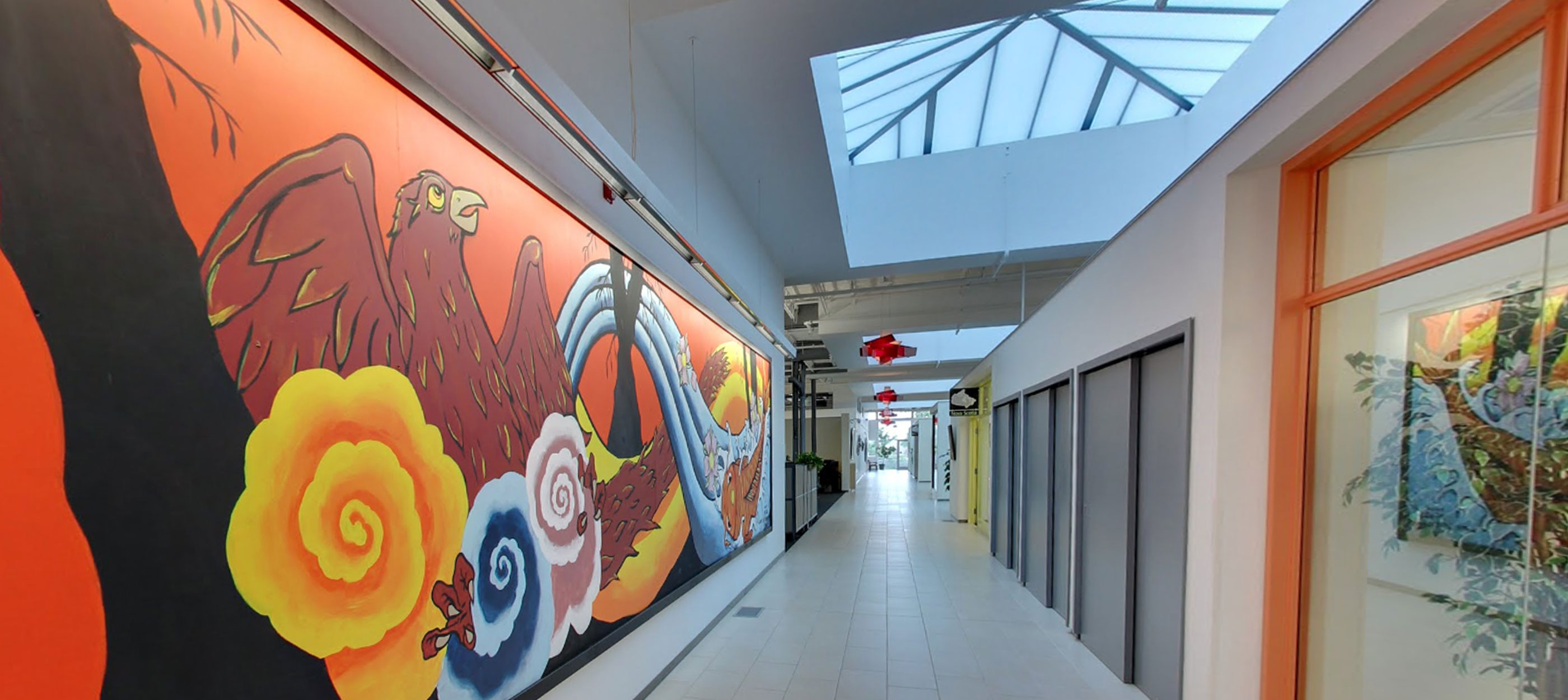 Hallway at CWB National Leasing head office featuring large mural from Graffiti Art Gallery